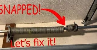 A broken torsion spring with a clean fracture in the middle showing a visible gap between coil sections.